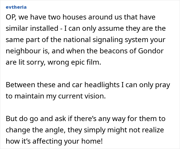 Neighbours installed actual sun-style bright outdoor light mounted on a house exterior shining brightly at night