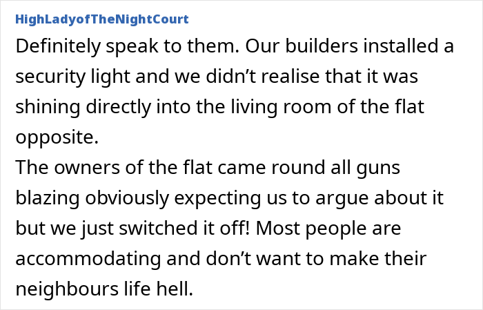 Neighbour-installed actual sun flooding a residential flat’s living room through a bright window on a sunny day.